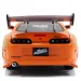 Fast &amp; Furious: Brian figurină și Toyota Supra model auto 1/24 - Simba Toys