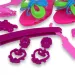 Set de frumusețe cu accesorii pentru coafor, pantofi și cercei într-o geantă